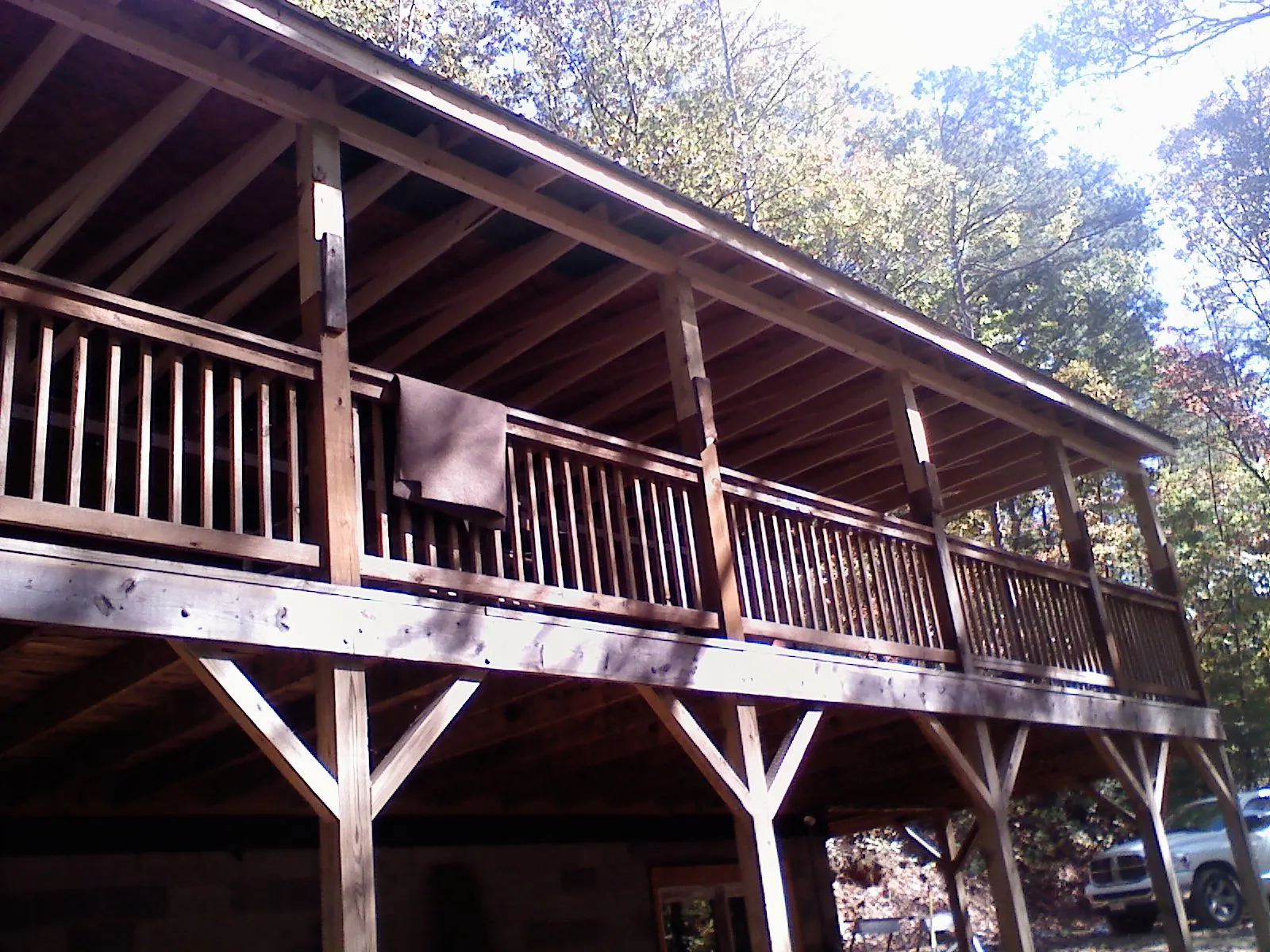 Timber framing under a new elevated porch and deck — Roof Leak Repair in Van Vleck by Roofing Brothers